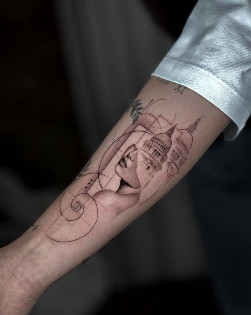 Tattoo of a woman's face intricately designed on an arm, showcasing artistry and personal expression.