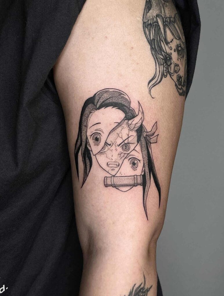 A tattoo depicting a woman's face split open, revealing a demon girl face inside.